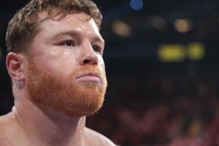 Canelo Alvarez (red trunks) and Gennadiy Golovkin (white trunks) box during a super middleweight championship bout at T-Mobile Arena.